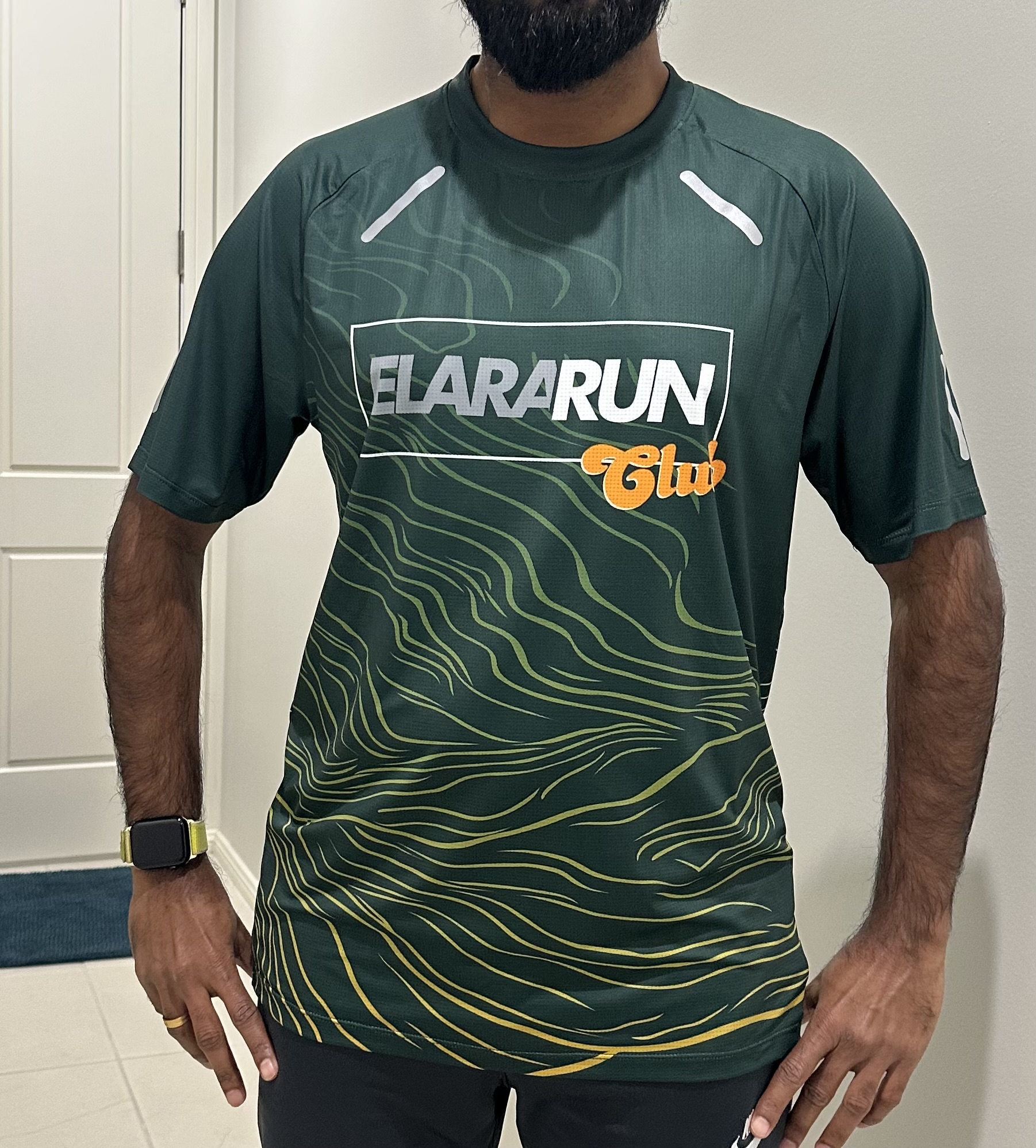 Front of the 2026 deep green club shirt on a model wearing size medium